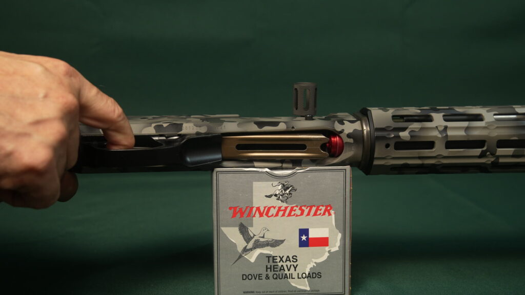 Enlarged loading port of a Benelli M4 TRIARC build, seen from below
