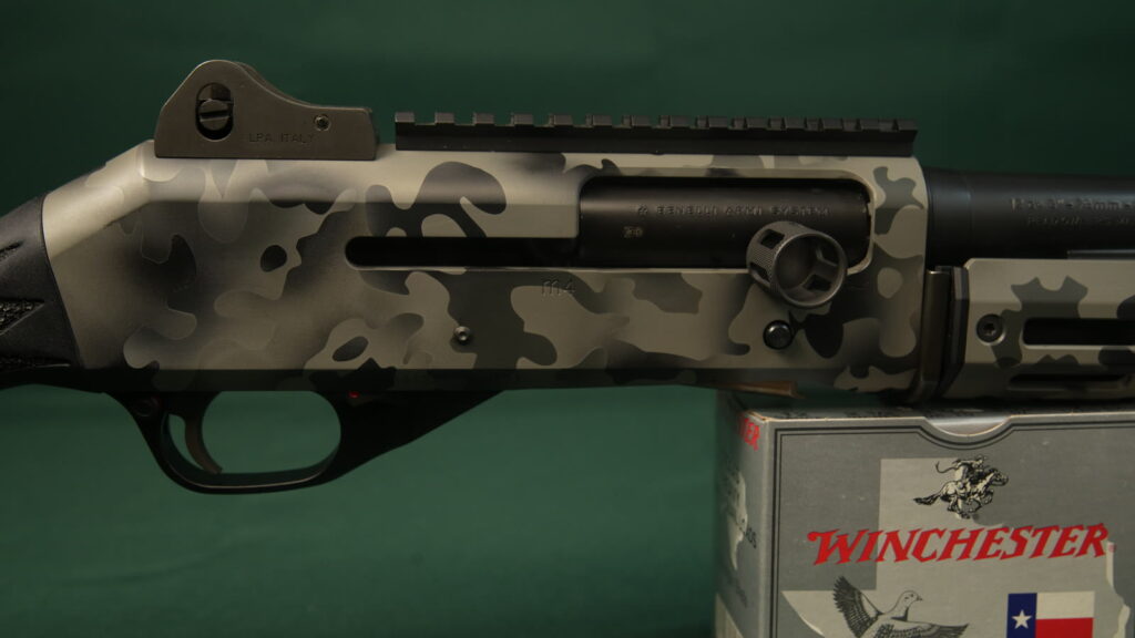 Benelli M4 TRIARC build in gray camo Cerakote, right side of the receiver